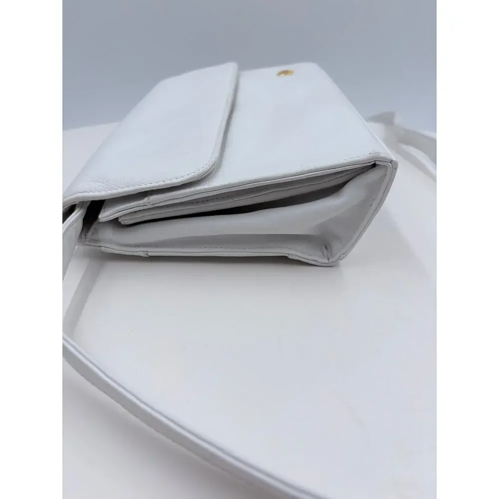 Ettienne white crossbody with wallet, makeup purse, detachable key ring and more